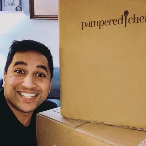 Consultant with several Pampered Chef boxes